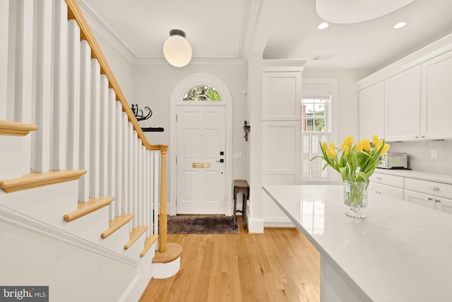 808 Cameron St, Alexandria, VA 22314 - foyer with stairs, crown molding, light wood-type flooring, recessed lighting, and baseboards