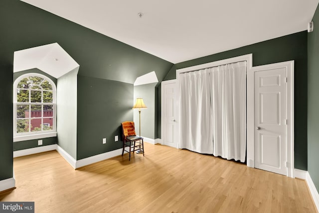 808 Cameron St, Alexandria, VA 22314 - additional living space featuring wood finished floors, baseboards, and vaulted ceiling