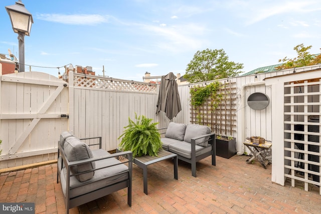 808 Cameron St, Alexandria, VA 22314 - fenced backyard with a gate, a patio, and an outdoor living space
