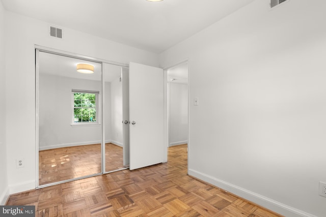 2107 N Taft St Unit 11, Arlington, VA 22201 - unfurnished bedroom with baseboards and a closet