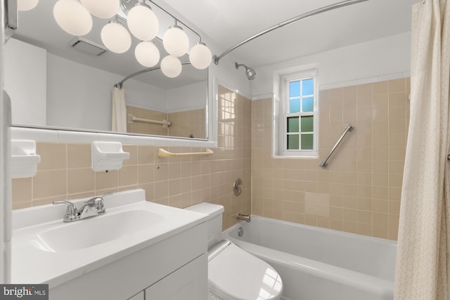 2107 N Taft St Unit 11, Arlington, VA 22201 - bathroom with shower / bath combo, toilet, vanity, and tile walls