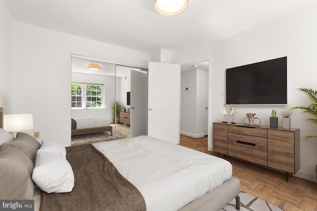 2107 N Taft St Unit 11, Arlington, VA 22201 - bedroom featuring a closet and baseboards