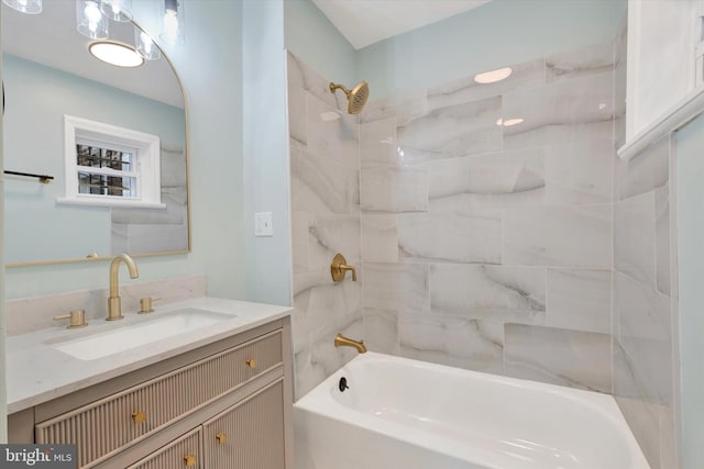 full bath featuring vanity and  shower combination