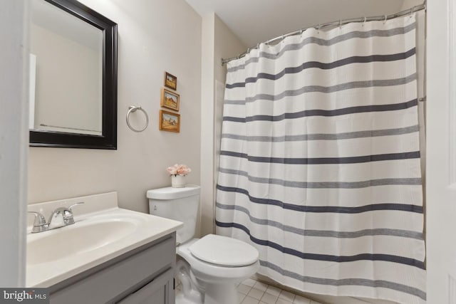 full bathroom with toilet, vanity, a shower with shower curtain, and tile patterned flooring