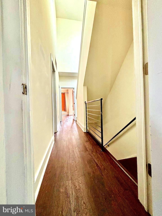 1219 N 5th St Unit 2, Philadelphia, PA 19122 - hallway featuring an upstairs landing, wood finished floors, and baseboards