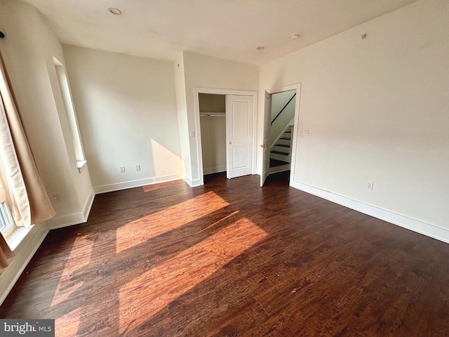 1219 N 5th St Unit 2, Philadelphia, PA 19122 - unfurnished bedroom featuring dark wood-style floors, baseboards, and a closet