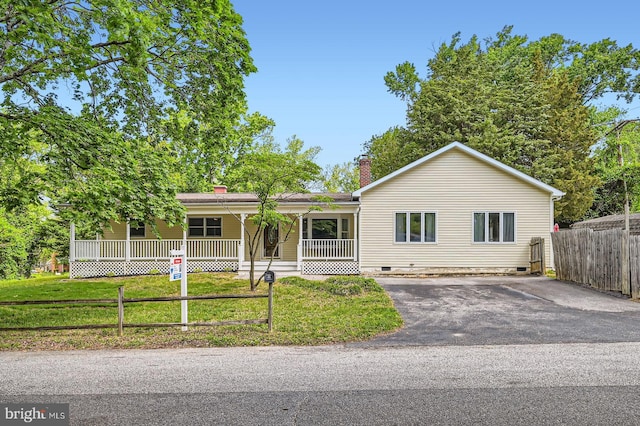 302 Haskell Dr, Arnold, MD 21012 - ranch-style house with covered porch, a chimney, crawl space, and asphalt driveway