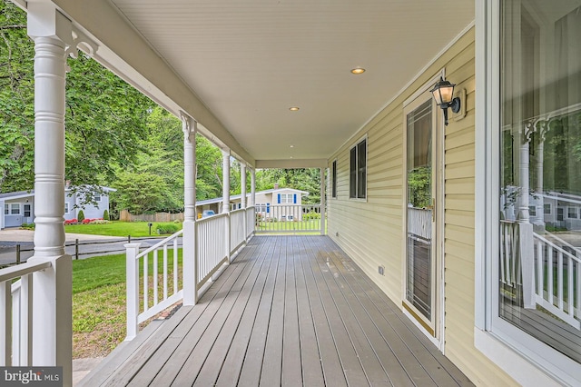 302 Haskell Dr, Arnold, MD 21012 - deck with covered porch and a yard