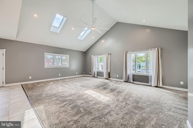 302 Haskell Dr, Arnold, MD 21012 - unfurnished living room featuring high vaulted ceiling, a skylight, ceiling fan, baseboards, and recessed lighting