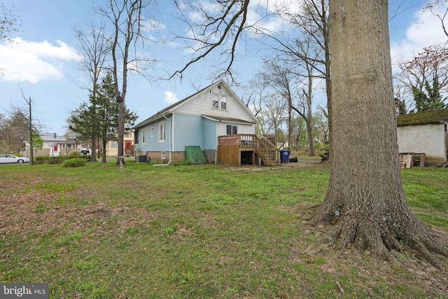 view of yard featuring a deck
