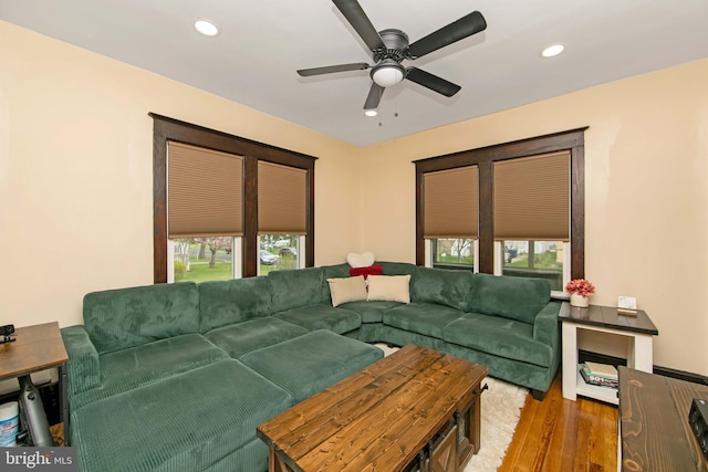 living room featuring a ceiling fan, wood finished floors, and recessed lighting