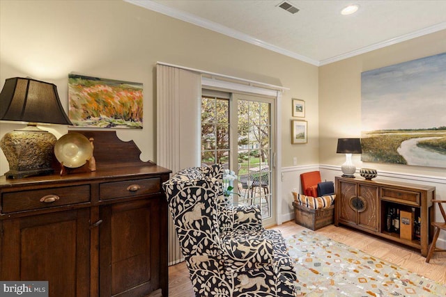 13113 Little Hayden Cir Unit 87, Hagerstown, MD 21742 - sitting room featuring wainscoting, visible vents, crown molding, and light wood-style flooring