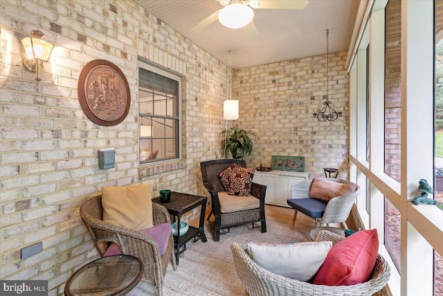 13113 Little Hayden Cir Unit 87, Hagerstown, MD 21742 - living area featuring brick wall and a ceiling fan