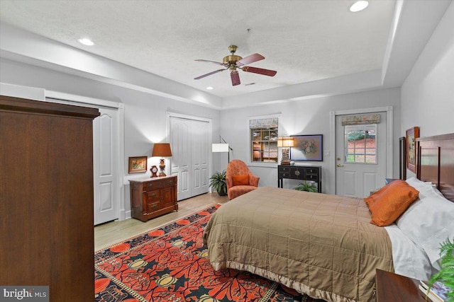 13113 Little Hayden Cir Unit 87, Hagerstown, MD 21742 - bedroom with a ceiling fan, light wood-style flooring, recessed lighting, and a textured ceiling
