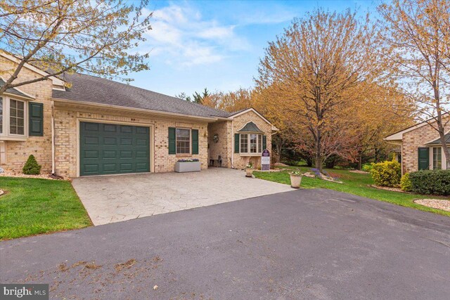 13113 Little Hayden Cir Unit 87, Hagerstown, MD 21742 - ranch-style home with roof with shingles, driveway, an attached garage, a front lawn, and brick siding