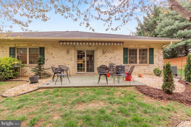 13113 Little Hayden Cir Unit 87, Hagerstown, MD 21742 - back of house with a patio, brick siding, and a yard