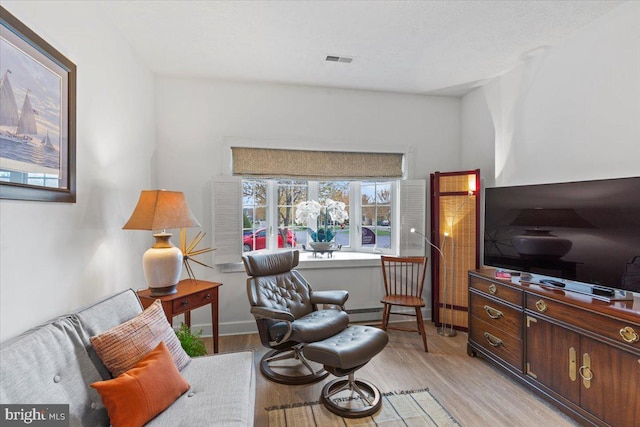 13113 Little Hayden Cir Unit 87, Hagerstown, MD 21742 - living area featuring light wood-type flooring and visible vents