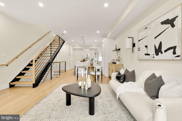 41 Q St NE Unit 2, Washington, DC 20002 - living area with light wood finished floors, recessed lighting, stairs, and baseboards