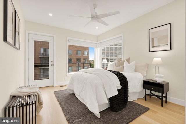 41 Q St NE Unit 2, Washington, DC 20002 - bedroom featuring light wood-type flooring, recessed lighting, access to exterior, baseboards, and a ceiling fan
