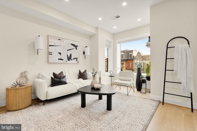 41 Q St NE Unit 2, Washington, DC 20002 - living room with wood finished floors, baseboards, and recessed lighting