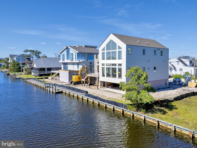 318 York Rd, South Bethany, DE 19930 - back of house featuring a water view and a residential view