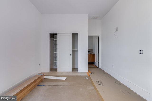 318 York Rd, South Bethany, DE 19930 - unfurnished bedroom featuring baseboards and a closet