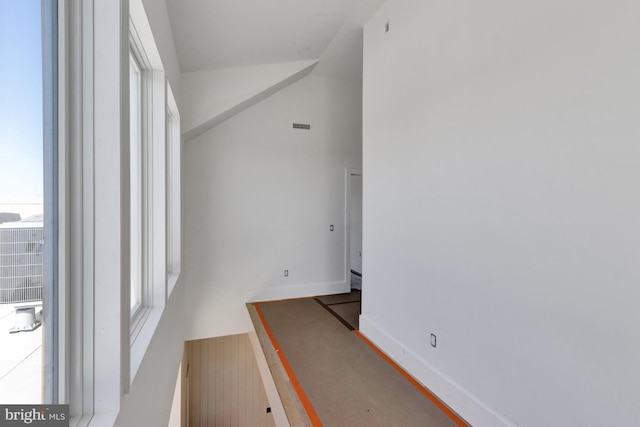 318 York Rd, South Bethany, DE 19930 - unfurnished room featuring baseboards and lofted ceiling