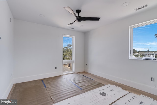 318 York Rd, South Bethany, DE 19930 - unfurnished room with a ceiling fan, baseboards, and wood finished floors