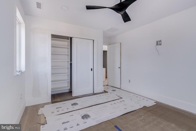 318 York Rd, South Bethany, DE 19930 - unfurnished bedroom featuring baseboards, a closet, and ceiling fan
