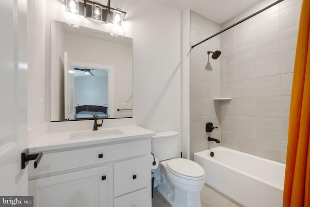 ensuite bathroom with vanity, ensuite bath, toilet, visible vents, and bathtub / shower combination
