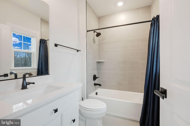 bathroom featuring shower / bath combo, tile patterned flooring, toilet, and vanity