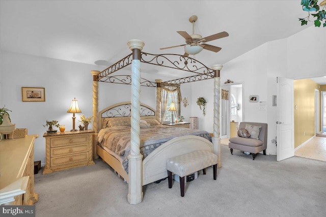 bedroom featuring ceiling fan, light carpet, and lofted ceiling
