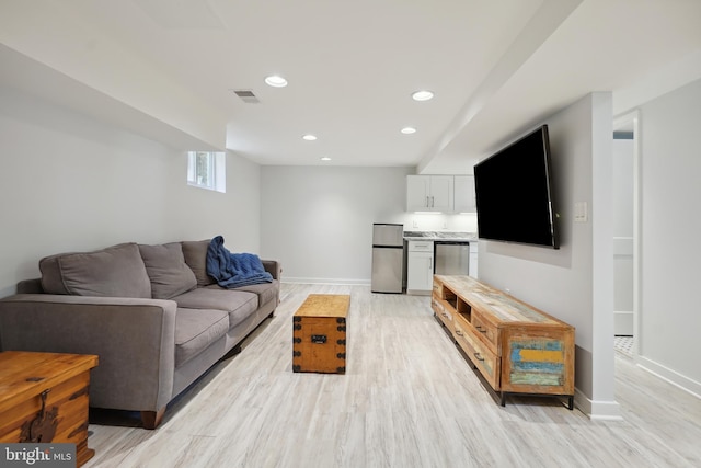 7812 Takoma Ave, Takoma Park, MD 20912 - living room with baseboards, light wood-style flooring, and recessed lighting