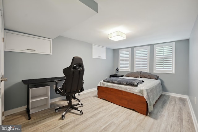 7812 Takoma Ave, Takoma Park, MD 20912 - bedroom with wood finished floors, baseboards, and an office area