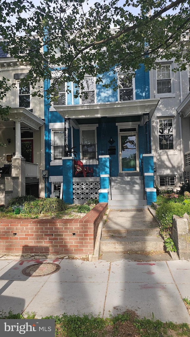 3563 Holmead Pl NW, Washington, DC 20010 - multi unit property featuring a porch