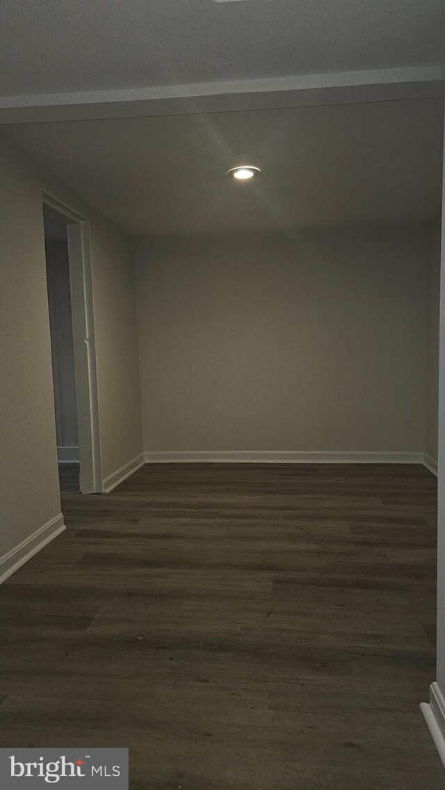3563 Holmead Pl NW, Washington, DC 20010 - unfurnished room featuring baseboards, recessed lighting, and dark wood-style flooring