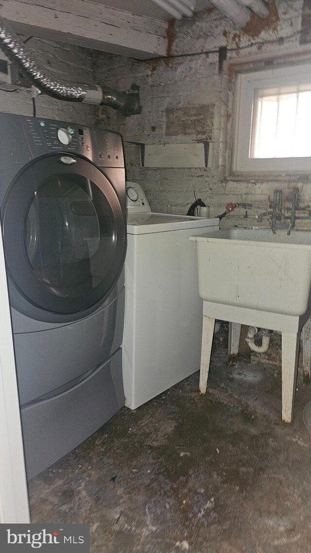 3563 Holmead Pl NW, Washington, DC 20010 - laundry area with laundry area and washing machine and clothes dryer