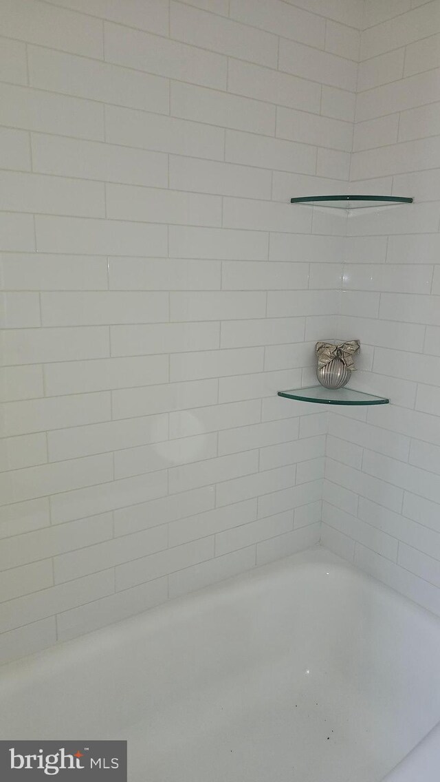 3563 Holmead Pl NW, Washington, DC 20010 - interior details featuring a tub and a shower