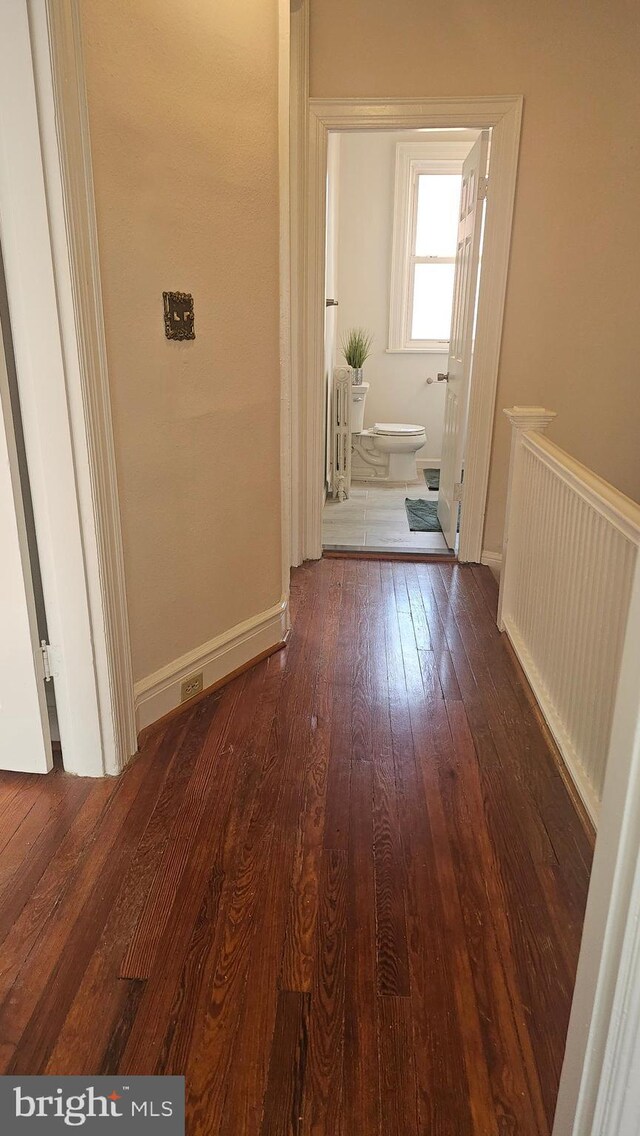 3563 Holmead Pl NW, Washington, DC 20010 - corridor featuring baseboards and wood-type flooring
