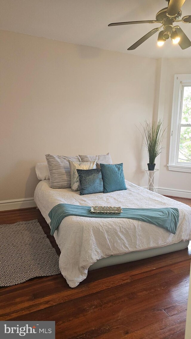 3563 Holmead Pl NW, Washington, DC 20010 - bedroom with baseboards, a ceiling fan, and wood finished floors