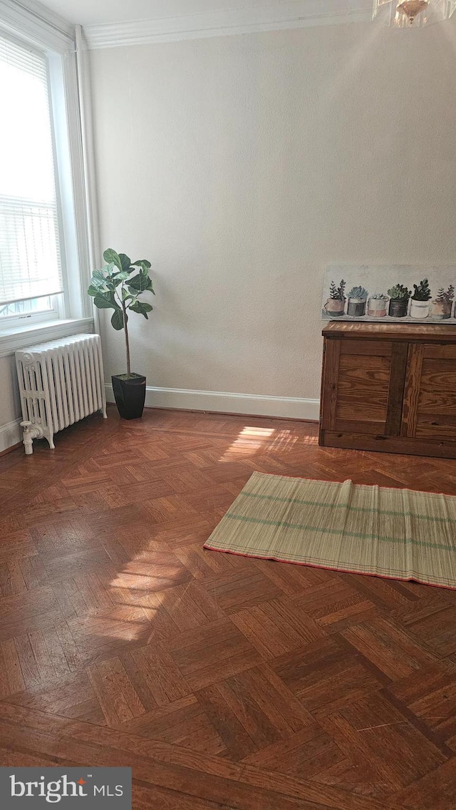 3563 Holmead Pl NW, Washington, DC 20010 - interior space with crown molding, baseboards, and radiator heating unit
