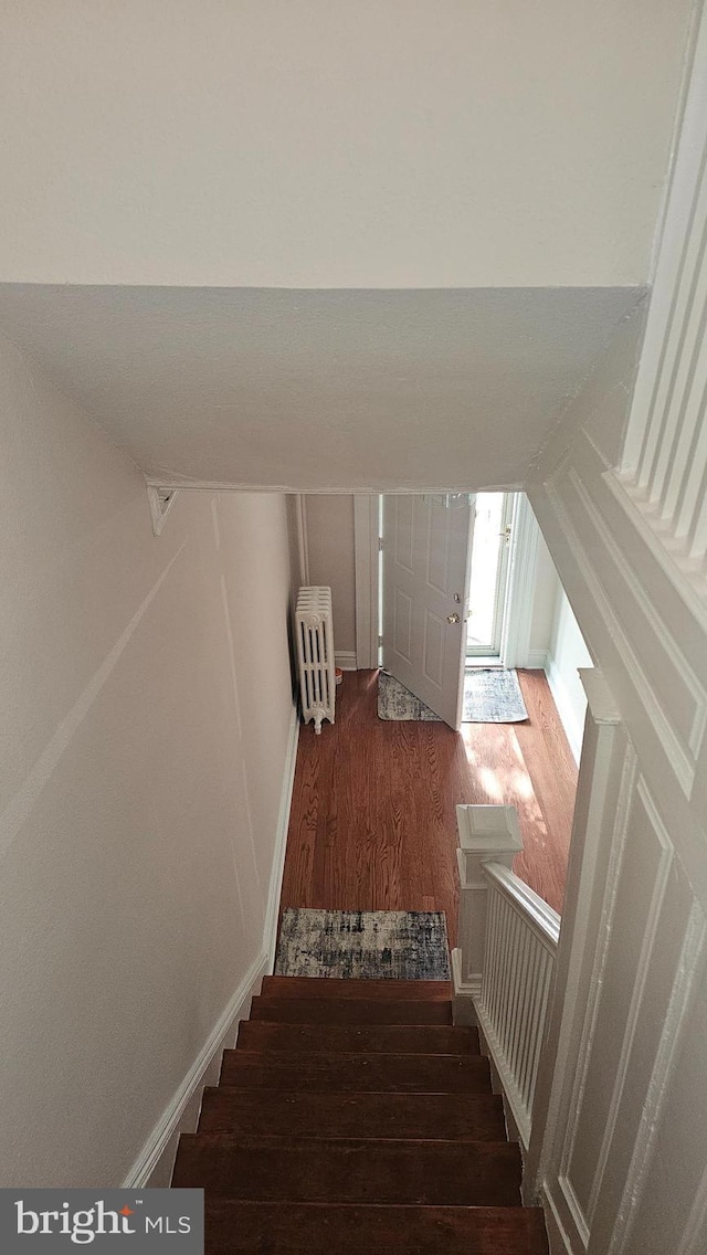 3563 Holmead Pl NW, Washington, DC 20010 - stairway featuring wood finished floors and lofted ceiling