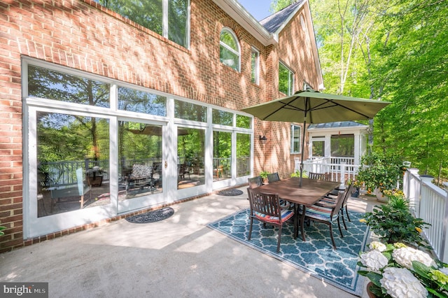 view of patio with outdoor dining area
