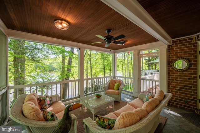 sunroom / solarium with ceiling fan and a wealth of natural light