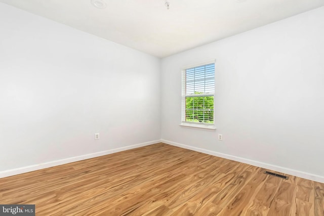 5830 Shady Oak Ln, Elkridge, MD 21075 - spare room featuring wood finished floors and baseboards
