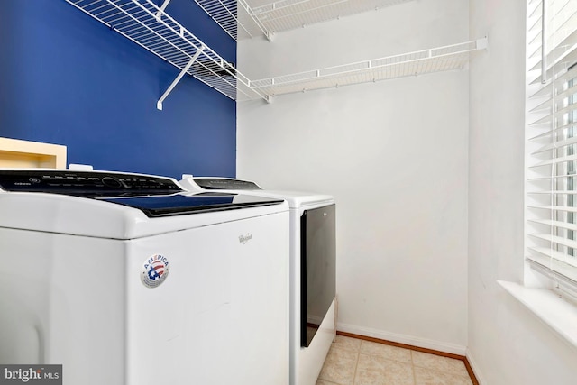 5830 Shady Oak Ln, Elkridge, MD 21075 - laundry area featuring independent washer and dryer, baseboards, and tile patterned floors