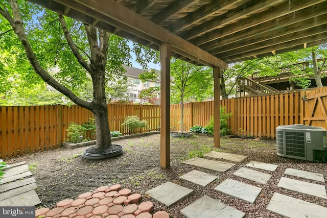 5830 Shady Oak Ln, Elkridge, MD 21075 - view of patio featuring central AC and a fenced backyard