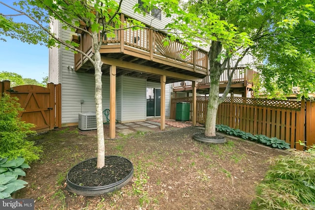 5830 Shady Oak Ln, Elkridge, MD 21075 - fenced backyard featuring a gate, central AC, and a wooden deck