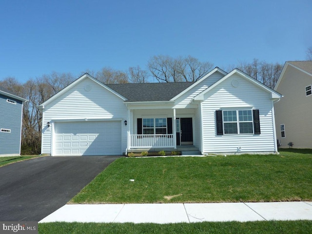 ranch-style house featuring a porch, an attached garage, a front lawn, and aphalt driveway