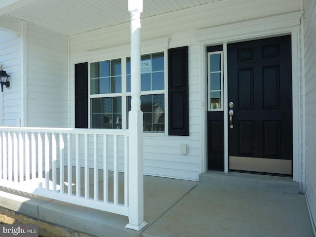 entrance to property with a porch